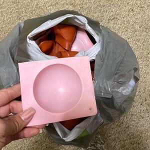 Big bag full of cocoa bomb silicone molds
